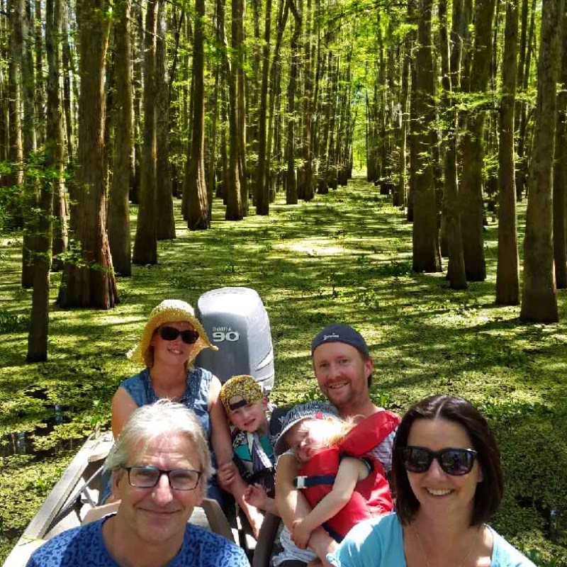 a group of people in a forest