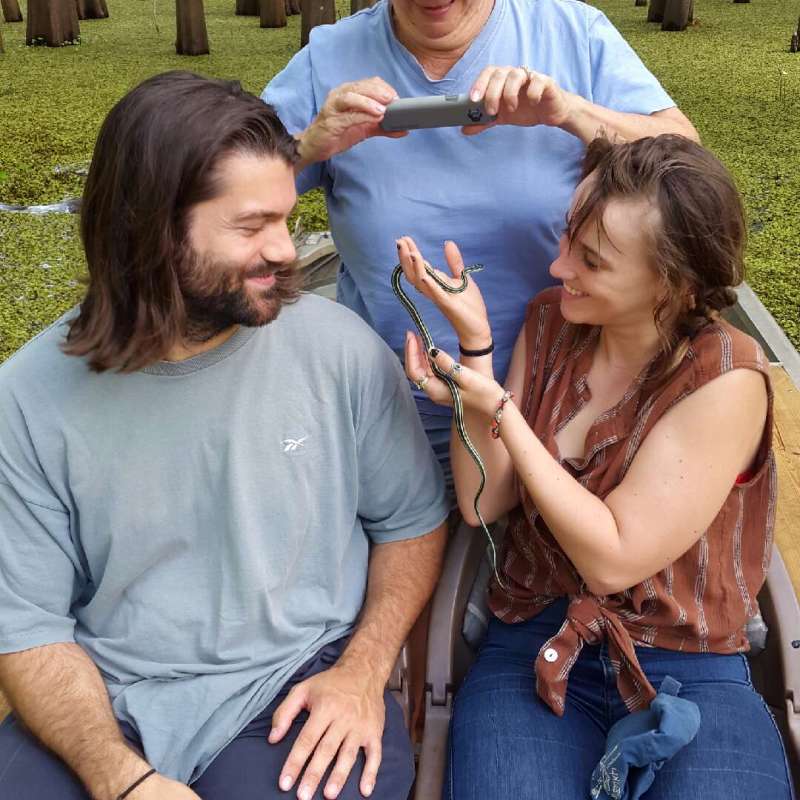 a group of people sitting at a park